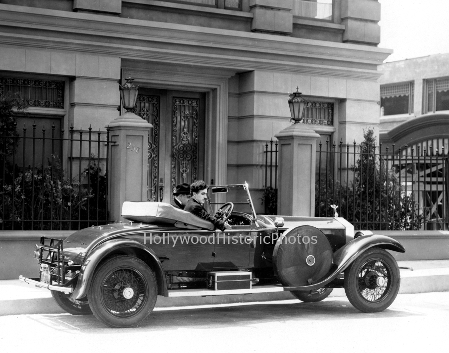 Charlie Chaplin 1931 In his 1931 Rolls Royce at Chaplin Studios.jpg